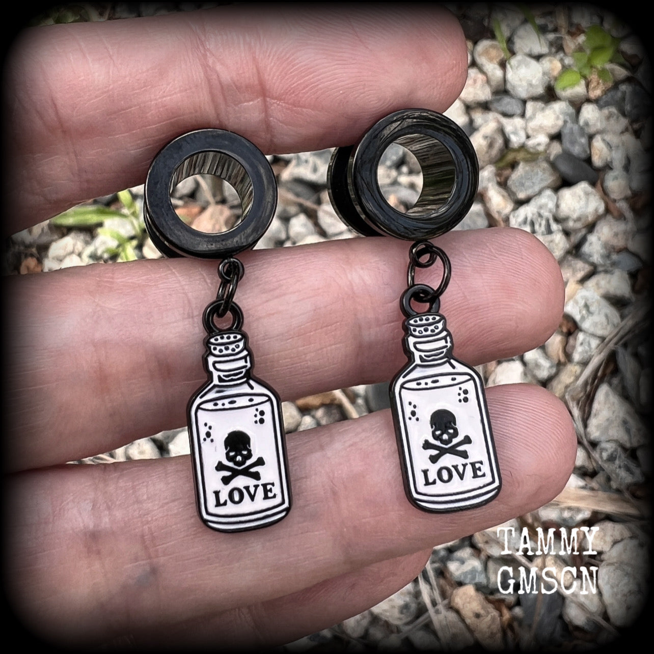 Love potions Love potion bottle Love spell Skull earrings Skull tunnels Tunnel earrings Tunnel dangles Halloween ear gauges Halloween gauged earrings Spell bottle Gothic jewelry Emo jewelry Spooky cute earrings Spooky earrings Cute tunnels Samhain