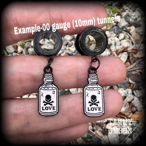 Love potions Love potion bottle Love spell Skull earrings Skull tunnels Tunnel earrings Tunnel dangles Halloween ear gauges Halloween gauged earrings Spell bottle Gothic jewelry Emo jewelry Spooky cute earrings Spooky earrings Cute tunnels Samhain