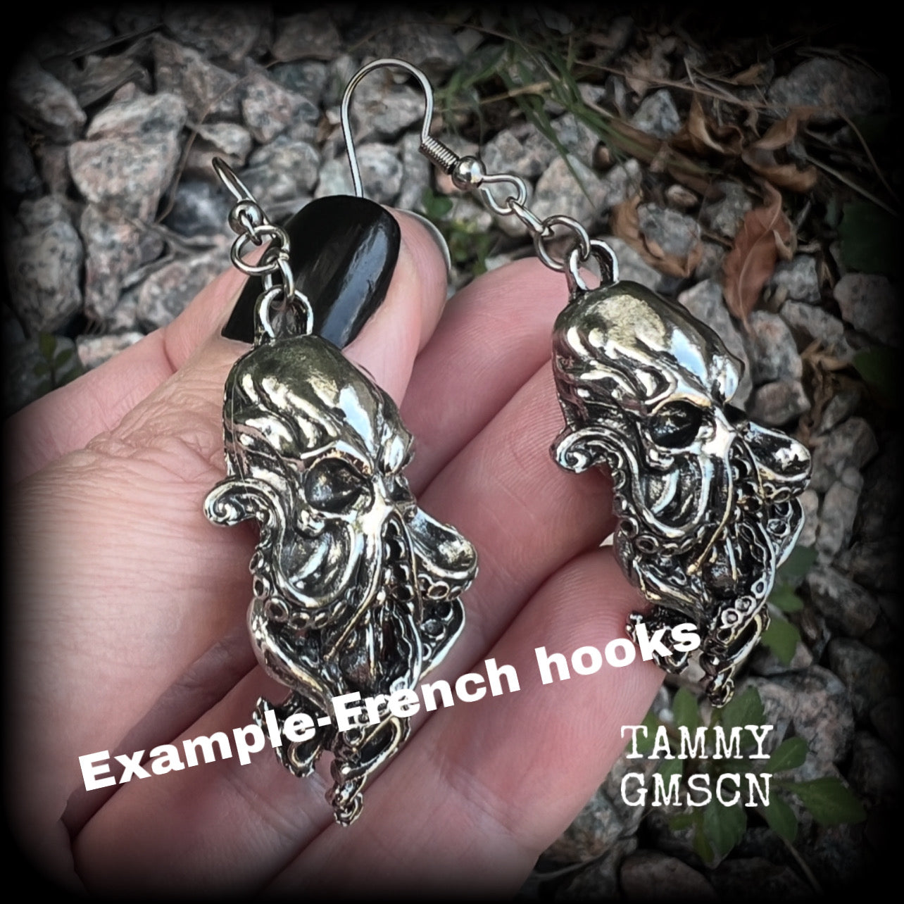 Featuring antique silver elder god Chuthulu charms, these earrings weigh approx 8 grams each, and are nice and dangly, measuring just over 6cms from tip to tip.

This pair have been made with stainless steel french hooks, suitable for pierced ears.