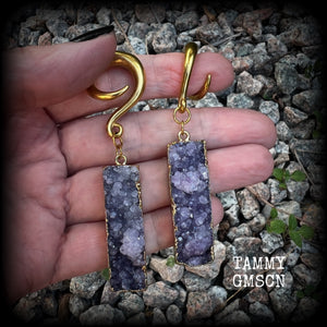Featuring gorgeous purple druzy and antique gold crystals, these unique gauged earrings measure approx 8cms from tip to tip, and weighing approx 15 grams each.  This pair have been made on 2 gauge (6mm) titanium coated surgical steel full curl hooks, for stretched lobes.