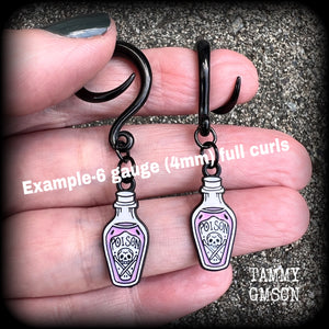 Poison bottle Love potion bottle Love spell Skull earrings Skull tunnels Tunnel earrings Tunnel dangles Halloween ear gauges Halloween gauged earrings Spell bottle Gothic jewelry Emo jewelry Spooky cute earrings Spooky earrings Cute tunnels Samhain