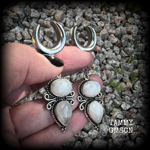 These beautiful boho moonstone earrings are made with gorgeous polished gemstones in an antique silver setting, lovely and dangly measuring approx 7cms from tip to tip, and weighing approx 12 grams each.   These earrings have been made on 5/8” gauge (16mm) surgical steel cradles, to be worn in stretched lobes.