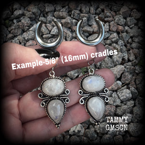 These beautiful boho moonstone earrings are made with gorgeous polished gemstones in an antique silver setting, lovely and dangly measuring approx 7cms from tip to tip, and weighing approx 12 grams each.   These earrings have been made on 5/8” gauge (16mm) surgical steel cradles, to be worn in stretched lobes.