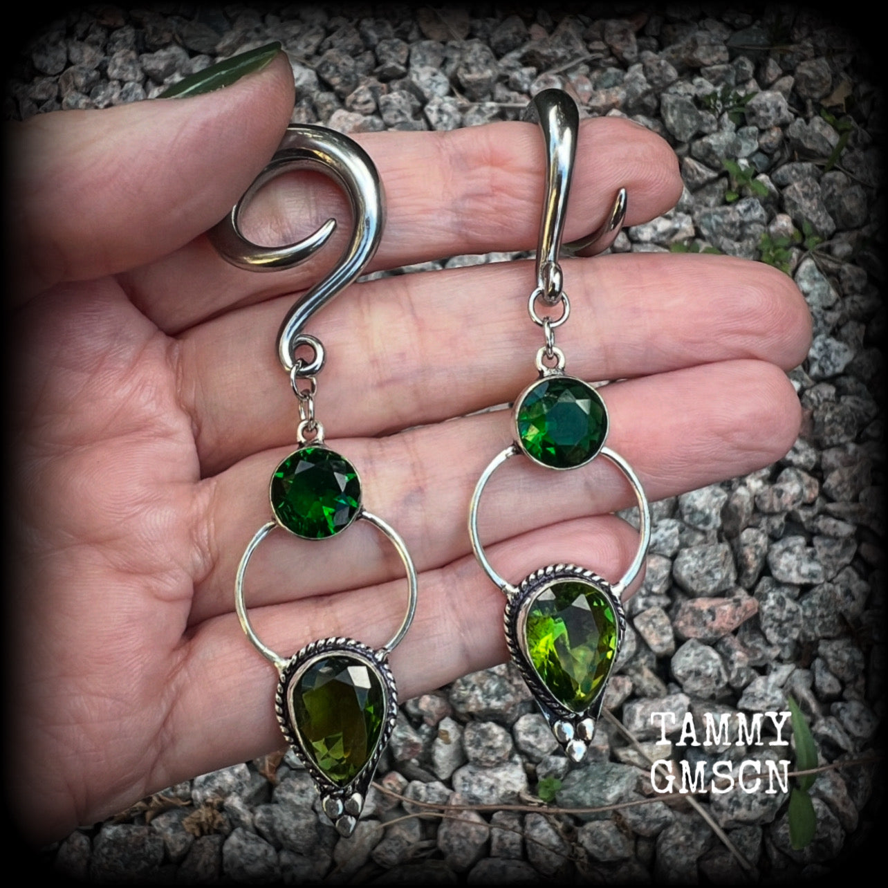 This pair of beautifully dangly earrings features gorgeous green peridot and green quartz gemstones in a boho antique silver setting, weighing approx 11grams a piece and measuring just over 8cms from tip to tip.  This pair have been made on 2 gauge (6mm) surgical steel full curl hooks, to be worn in stretched lobes.