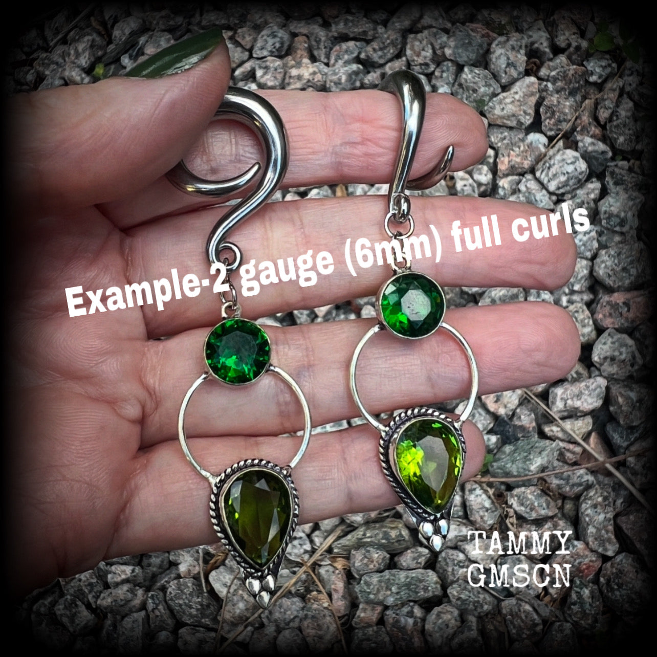 This pair of beautifully dangly earrings features gorgeous green peridot and green quartz gemstones in a boho antique silver setting, weighing approx 11grams a piece and measuring just over 8cms from tip to tip.  This pair have been made on 2 gauge (6mm) surgical steel full curl hooks, to be worn in stretched lobes.