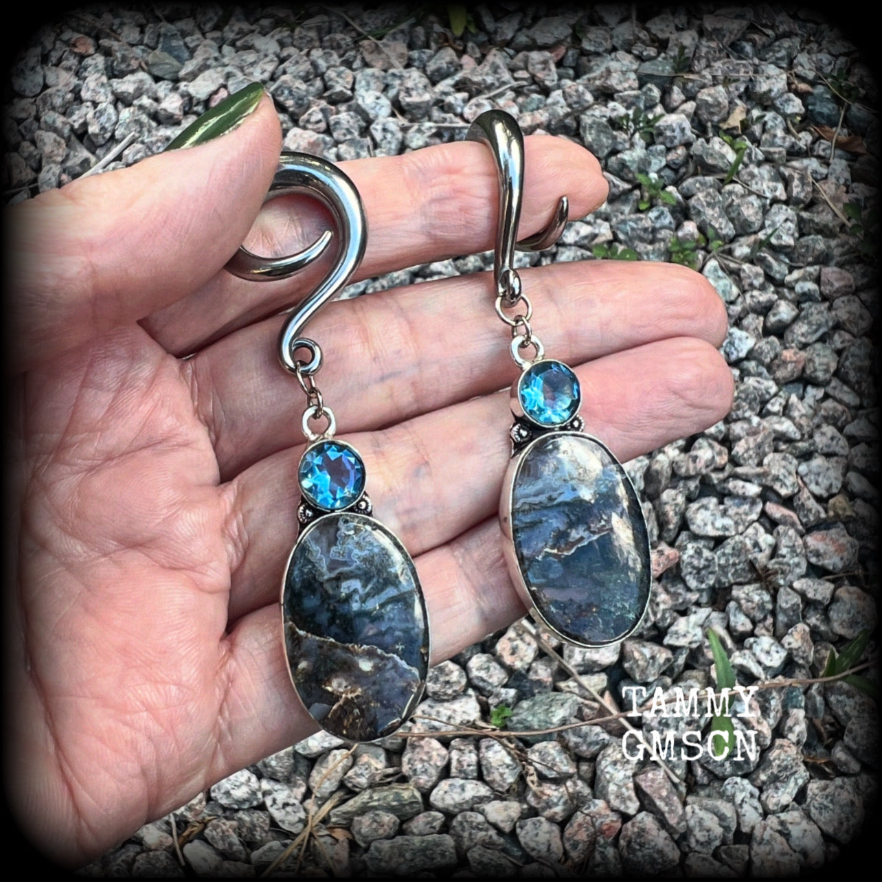 These unique gauged earrings feature unique Indian moss jasper gems dangling beneath beautiful facet blue topaz gemstones in a gorgeous boho antique silver setting, not too big at just on 7.5cms from tip to tip, and not too heavy, weighing approx 13 grams each.  These earrings have been made with 2 gauge (6mm) surgical steel full curl hooks, to be worn in stretched lobes.