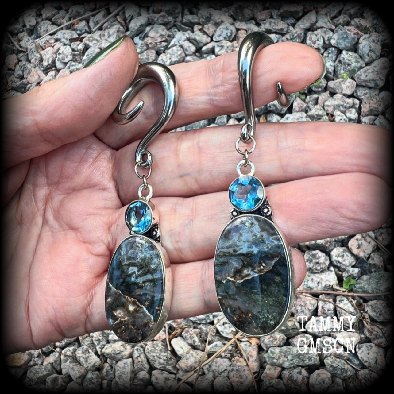 These unique gauged earrings feature unique Indian moss jasper gems dangling beneath beautiful facet blue topaz gemstones in a gorgeous boho antique silver setting, not too big at just on 7.5cms from tip to tip, and not too heavy, weighing approx 13 grams each.  These earrings have been made with 2 gauge (6mm) surgical steel full curl hooks, to be worn in stretched lobes.