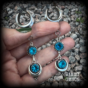 These earrings have been made with gorgeous facet sky blue topaz gemstones in a beautiful boho antique silver setting with crescent moon, lovely and dangly at just over 7.5cms from tip to tip, and not too heavy at just 8 grams each.  These earrings have been made on 5/8” gauge (16mm) surgical steel cradles, to be worn in stretched lobes.