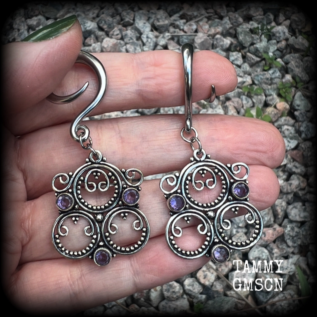 These gorgeous gauged earrings feature beautiful purple facet amethyst gemstones in an antique silver gypsy boho style setting, measuring just on 6cms from tip to tip, and weighing approx 6 grams each, not too heavy...  This pair have been made on 6 gauge (6mm) surgical steel full curls-suitable for stretched lobes.