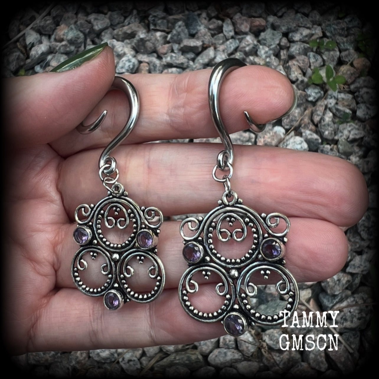 These gorgeous gauged earrings feature beautiful purple facet amethyst gemstones in an antique silver gypsy boho style setting, measuring just on 6cms from tip to tip, and weighing approx 6 grams each, not too heavy...  This pair have been made on 6 gauge (6mm) surgical steel full curls-suitable for stretched lobes.