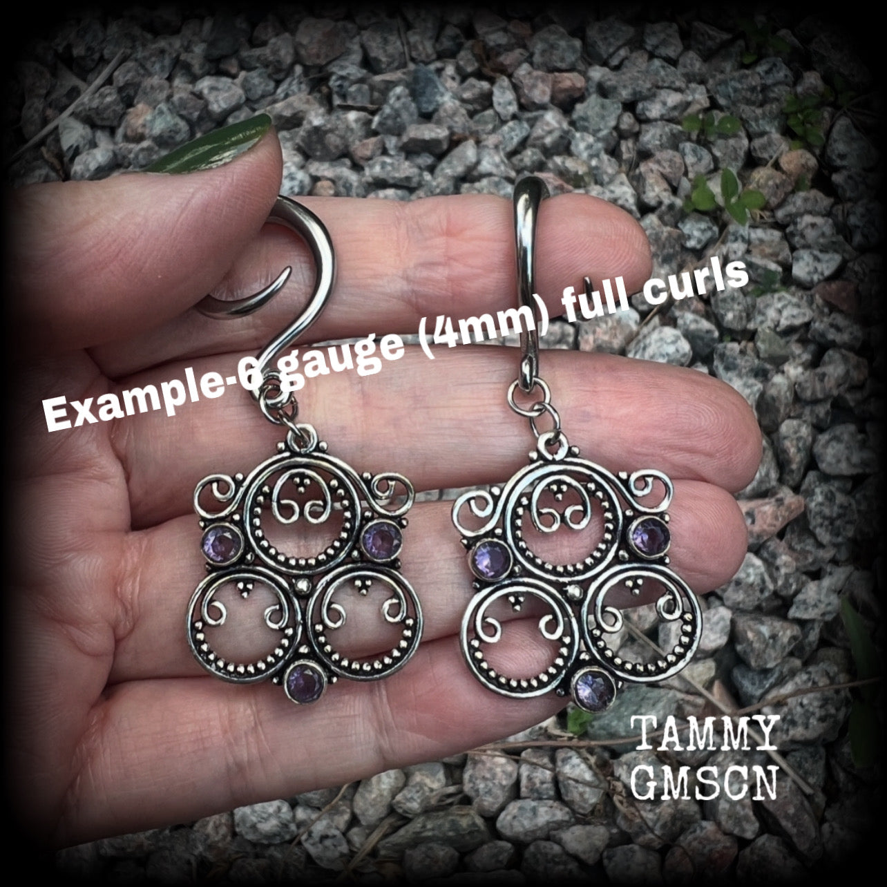 These gorgeous gauged earrings feature beautiful purple facet amethyst gemstones in an antique silver gypsy boho style setting, measuring just on 6cms from tip to tip, and weighing approx 6 grams each, not too heavy...  This pair have been made on 6 gauge (6mm) surgical steel full curls-suitable for stretched lobes.
