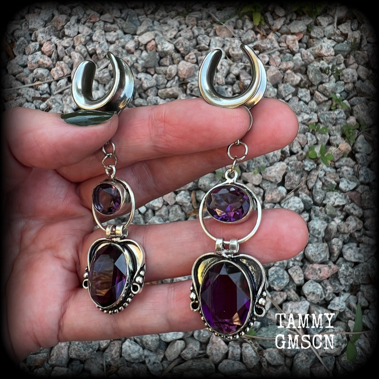 These gorgeous gauged earrings feature beautiful purple facet amethyst gemstones in an antique silver gypsy boho style setting, measuring just on 6cms from tip to tip, and weighing approx 6 grams each, not too heavy...

This pair have been made on 5/8” gauge (16mm) surgical steel cradles-suitable for stretched lobes.
