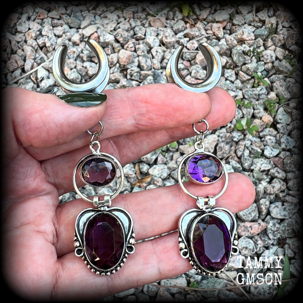 These gorgeous gauged earrings feature beautiful purple facet amethyst gemstones in an antique silver gypsy boho style setting, measuring just on 6cms from tip to tip, and weighing approx 6 grams each, not too heavy...

This pair have been made on 5/8” gauge (16mm) surgical steel cradles-suitable for stretched lobes.
