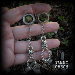 These awesome tunnel dangles feature classic antique silver hangmans nooses dangling from differing lengths of stainless steel chain, weighing only 11 grams each and measuring 9cms from tip to tip.

This pair has made on 5/8" (16mm) gauge standard surgical steel screw fit tunnels.