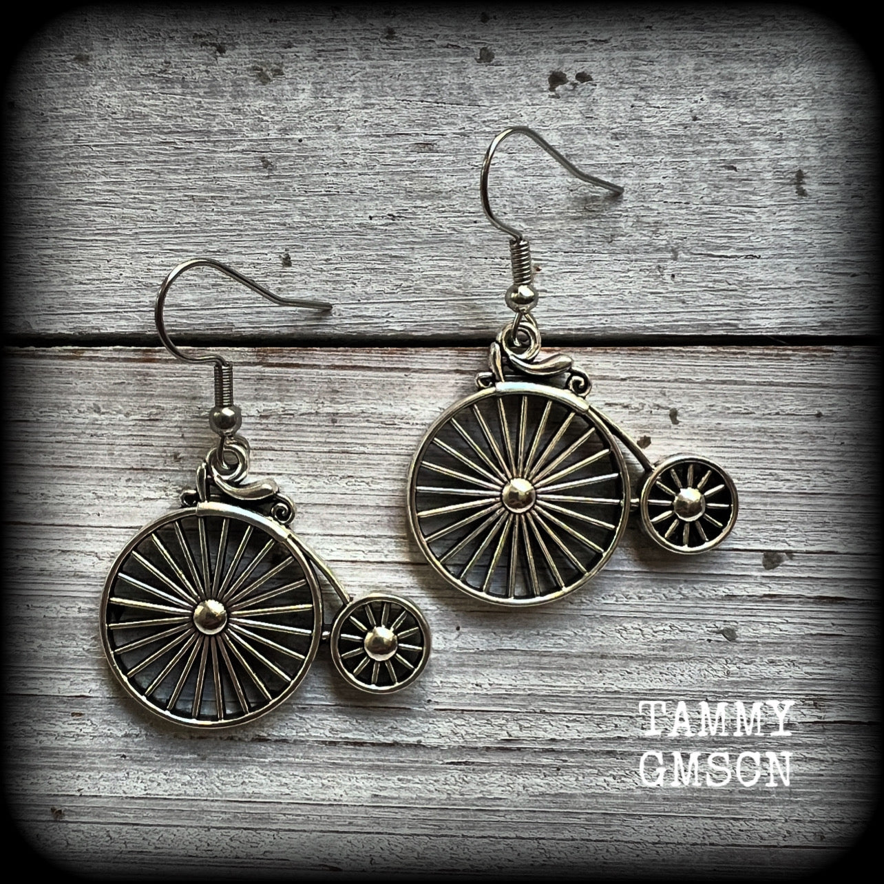 These adorably quirky Victorian era 'Penny Farthing' earrings are too cute!!
Measuring in at just under 5cms from tip to tip, these adorable earrings are also lightweight, weighing only a few grams each.

This pair has been made on stainless steel french hooks, for pierced ears.