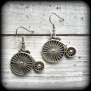 These adorably quirky Victorian era 'Penny Farthing' earrings are too cute!!
Measuring in at just under 5cms from tip to tip, these adorable earrings are also lightweight, weighing only a few grams each.

This pair has been made on stainless steel french hooks, for pierced ears.