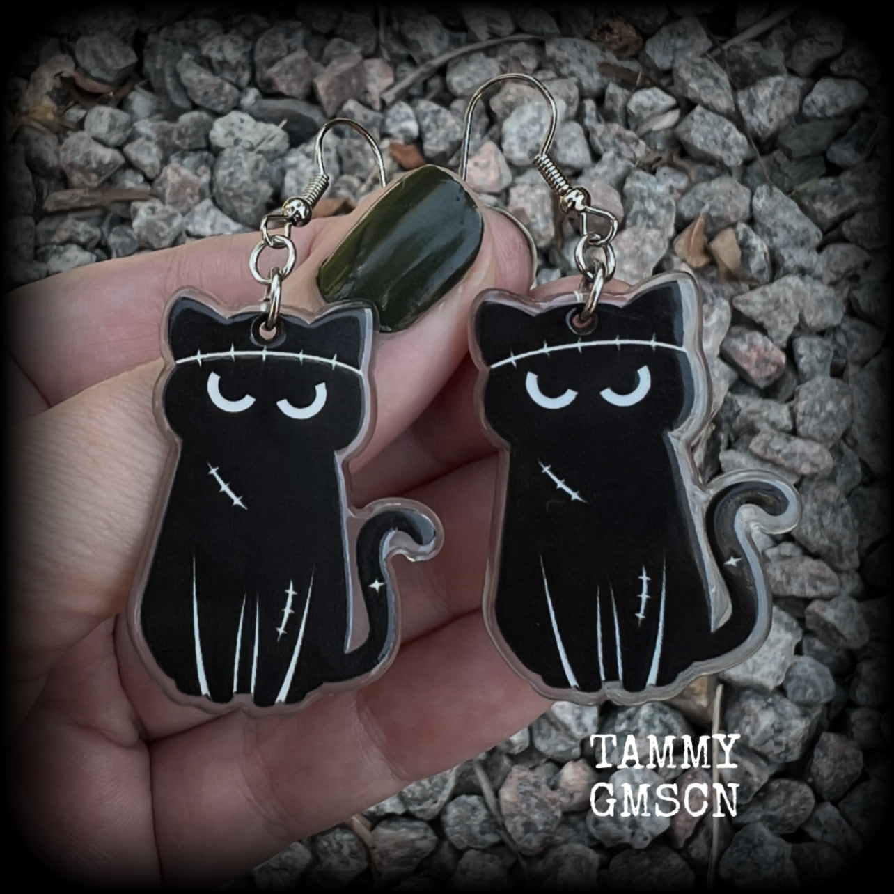 These awesome acrylic 'Zombie kitty' earrings measure in at just over 6cms from tip to tip, and are nice and dangly and nice and lightweight, weighing only a few grams each.  This pair has been made on stainless steel french hooks-suitable for pierced ears.