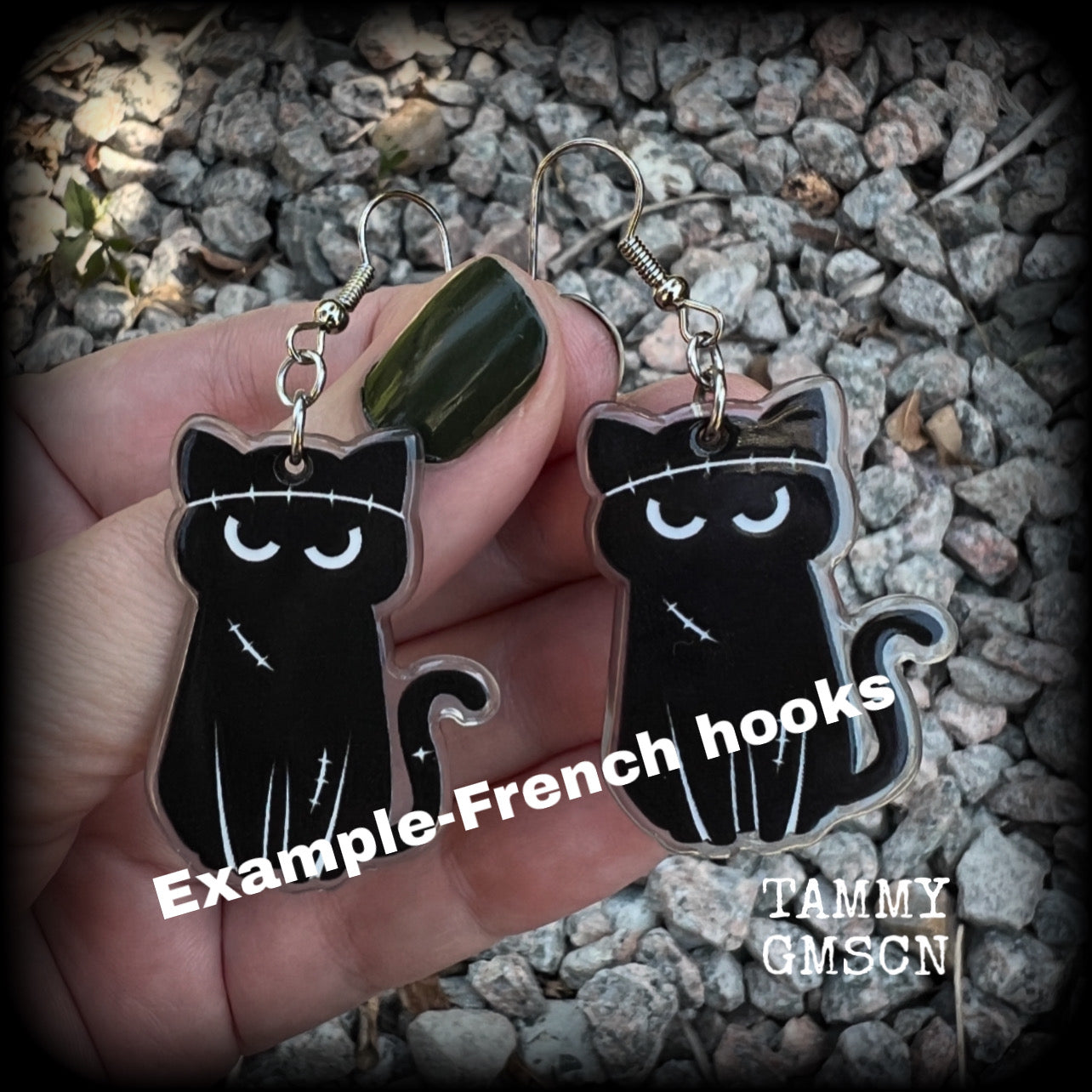 These awesome acrylic 'Zombie kitty' earrings measure in at just over 6cms from tip to tip, and are nice and dangly and nice and lightweight, weighing only a few grams each.  This pair has been made on stainless steel french hooks-suitable for pierced ears.