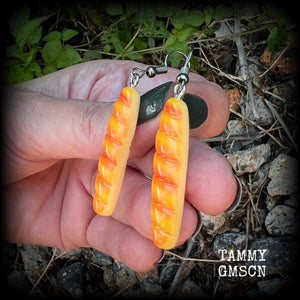 These cute little baguette earrings measure just on 6cms from tip to tip, and weigh only a few grams each.

This pair have been made on stainless steel french hooks, suitable for pierced ears.