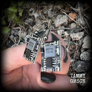 These awesome black and grey circuit board earrings measure just on 3cms from tip to tip, and weigh only 2 grams each, these are lovely and lightweight and not too dangly.

This pair has been made on stainless steel french hooks, to be worn in pierced ears.