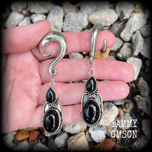 These earrings have been made with gorgeous pitch black obsidian gemstones, lovely and dangly at just over 8cms from tip to tip, and weighing approx 20 grams each.

These earrings have been made on 0 gauge (8mm) surgical steel full curl hooks, to be worn in stretched lobes.