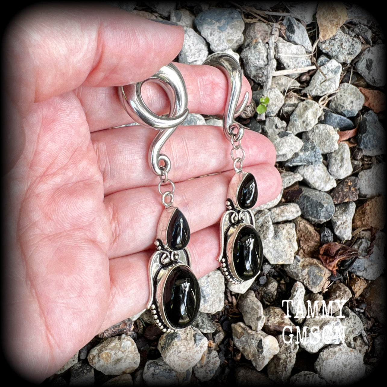 These earrings have been made with gorgeous pitch black obsidian gemstones, lovely and dangly at just over 8cms from tip to tip, and weighing approx 20 grams each.

These earrings have been made on 0 gauge (8mm) surgical steel full curl hooks, to be worn in stretched lobes.