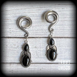 These earrings have been made with gorgeous pitch black obsidian gemstones, lovely and dangly at just over 8cms from tip to tip, and weighing approx 20 grams each.

These earrings have been made on 0 gauge (8mm) surgical steel full curl hooks, to be worn in stretched lobes.