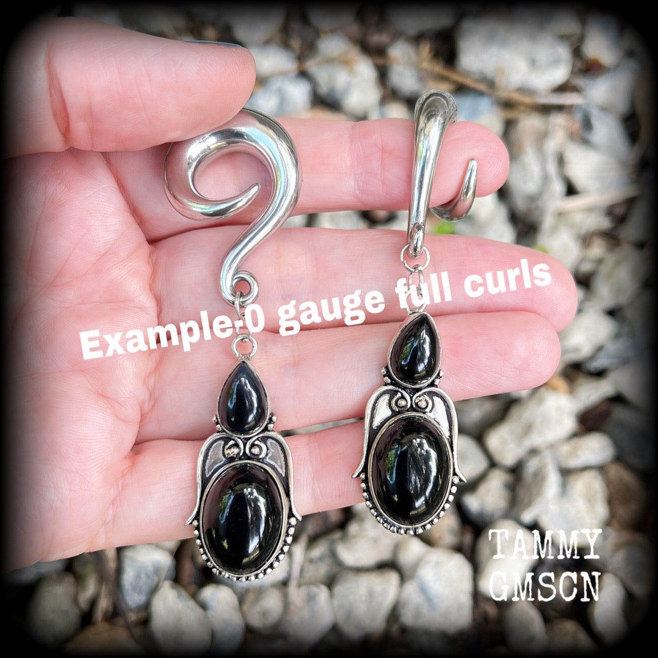 These earrings have been made with gorgeous pitch black obsidian gemstones, lovely and dangly at just over 8cms from tip to tip, and weighing approx 20 grams each.

These earrings have been made on 0 gauge (8mm) surgical steel full curl hooks, to be worn in stretched lobes.