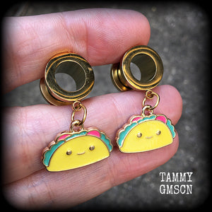 These adorable tunnel earrings feature cute little smiling tacos, weigh approx 5 grams each, and measure just over 3cms from tip to tip.

This pair has been made with 00 gauge (10mm) surgical steel screw fit tunnels, for stretched lobes.