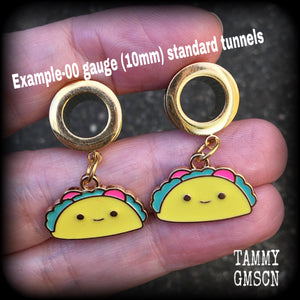 These adorable tunnel earrings feature cute little smiling tacos, weigh approx 5 grams each, and measure just over 3cms from tip to tip.

This pair has been made with 00 gauge (10mm) surgical steel screw fit tunnels, for stretched lobes.