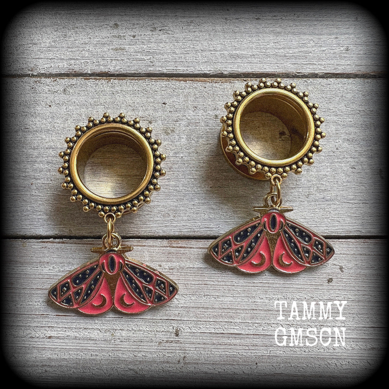 These gorgeous boho tunnel earrings feature a stunning pink and navy blue enamel butterfly with crescent moon wing details. These earrings weigh approx 8 grams each, and measure just under 5cms from tip to tip.

This pair has been made on 5/8" gauge (16mm) ornate surgical steel screw fit tunnels.