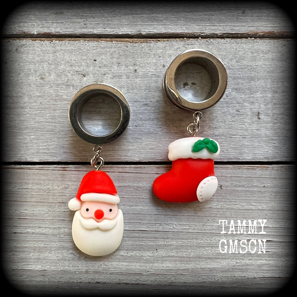 Featuring adorable lightweight fimo clay Santa Claus and Santa stocking charms, these earrings weigh approx 8 grams each, and are nice and dangly at just under 6cms from tip to tip.

This pair of earrings has been made on 9/16" gauge (14mm) surgical steel screw fit tunnels, suitable for stretched lobes.