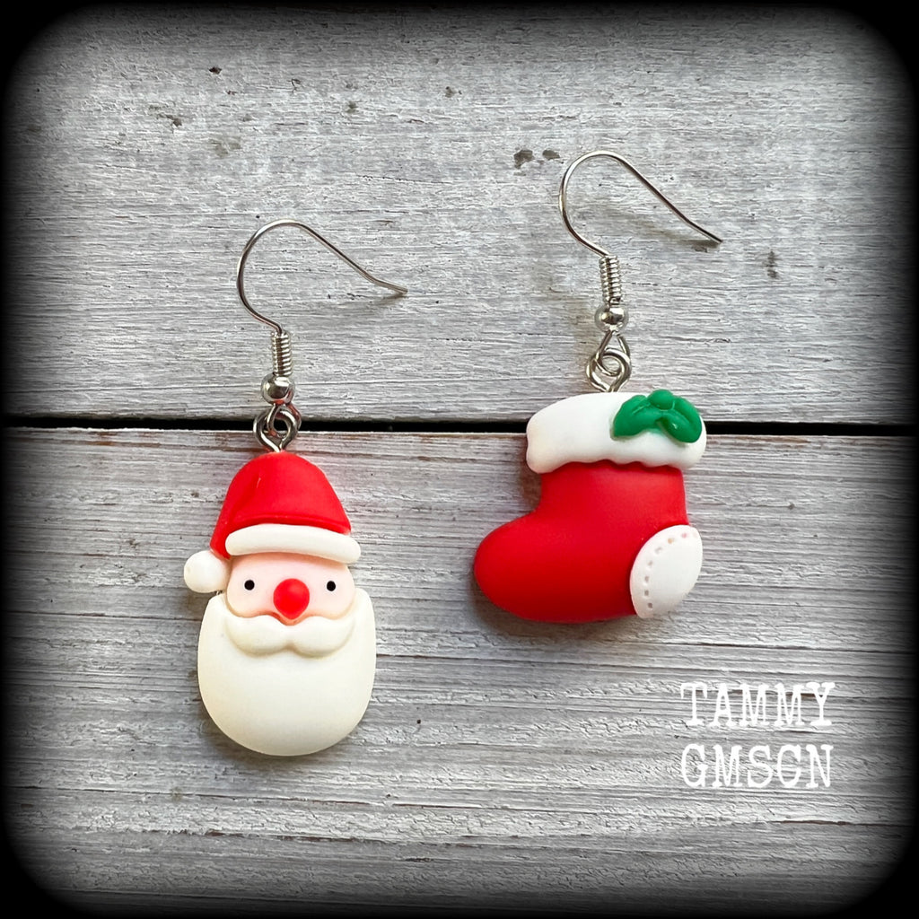 These adorable earrings feature festive Santa Claus and Santa stockings, are super lightweight, weighing only a few grams each and are nice and dangly, measuring approx 5 cms from tip to tip.

This pair of earrings has been made on stainless steel french hooks, suitable for pierced ears.