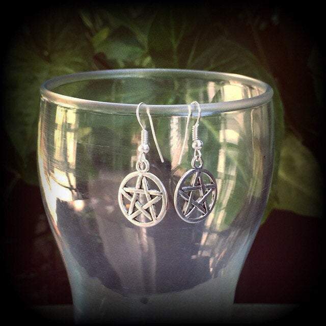 These antique silver pentagram earrings are light weight, weighing only a gram or two each and nice and dangly, measuring just over 4cms from tip to tip.
This pair has been made on stainless steel french hooks, suitable for pierced ears.