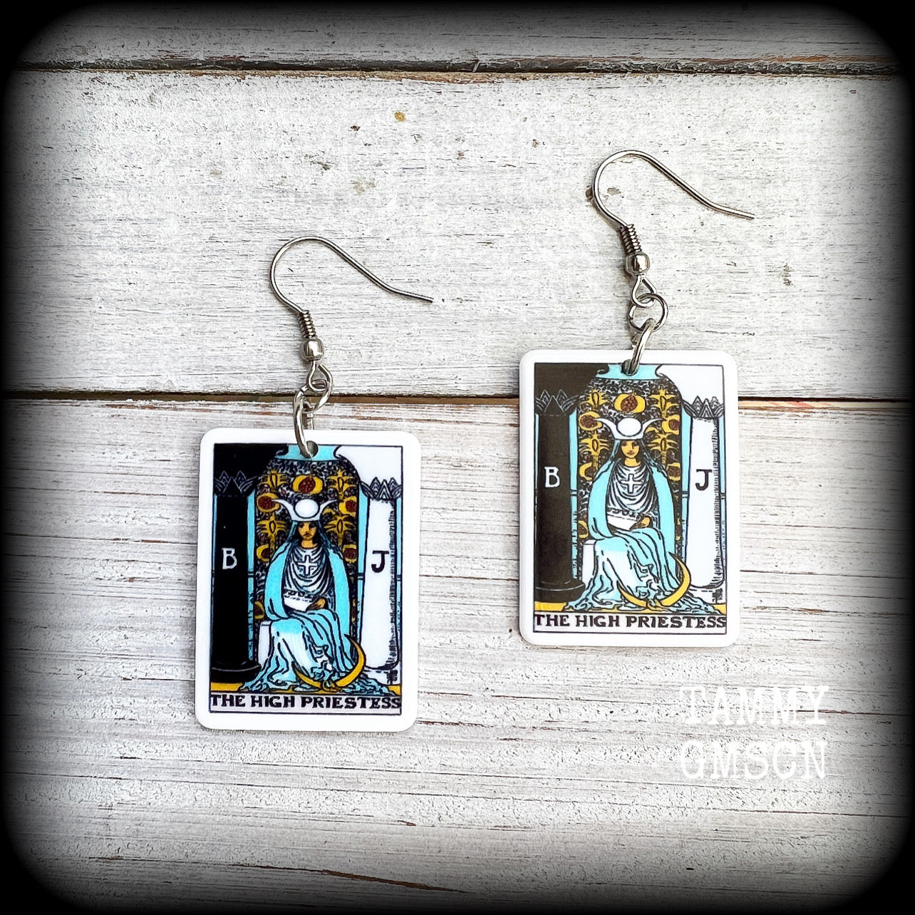 These classic Major Arcana earrings feature lightweight acrylic 'High Priestess' tarot card charms, measuring just under 6cms from tip to tip and weighing only a gram or two each.

This pair has been made with stainless steel french hooks, suitable for pierced ears.