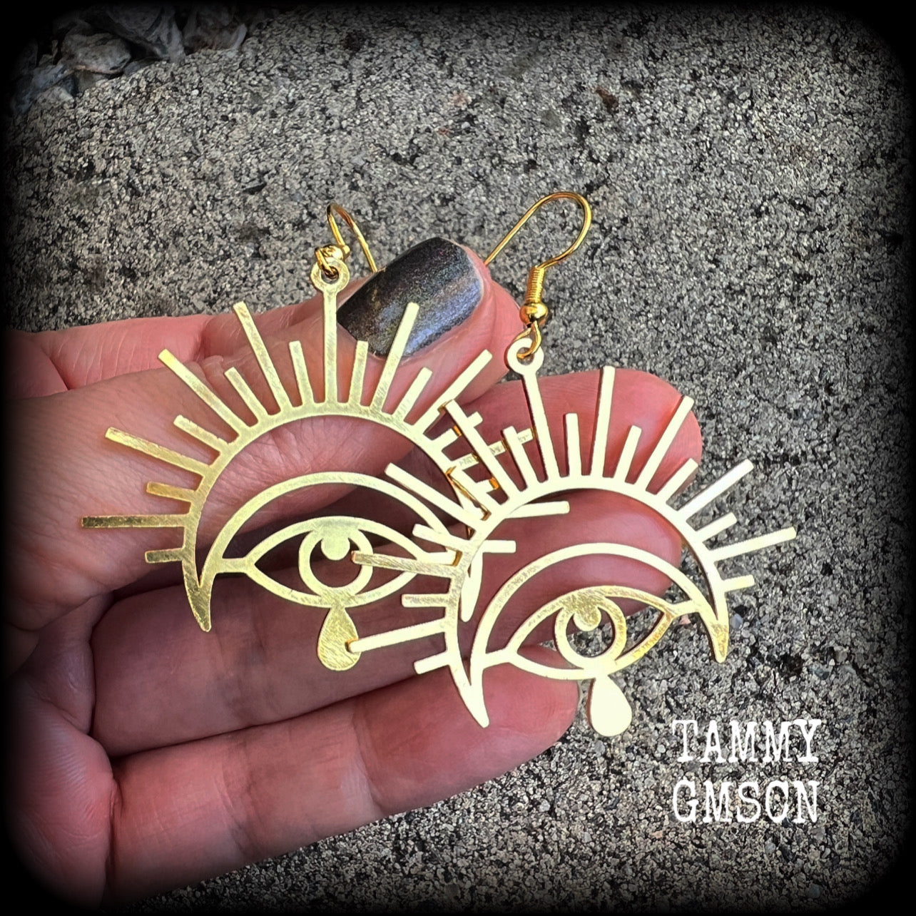 These gorgeous All seeing eye earrings have been made with titanium coated stainless steel charms, measure just on 6cms from tip to tip, and weigh only a gram or two each.

These earrings have been made on antique gold french hooks, suitable for pieced ears.