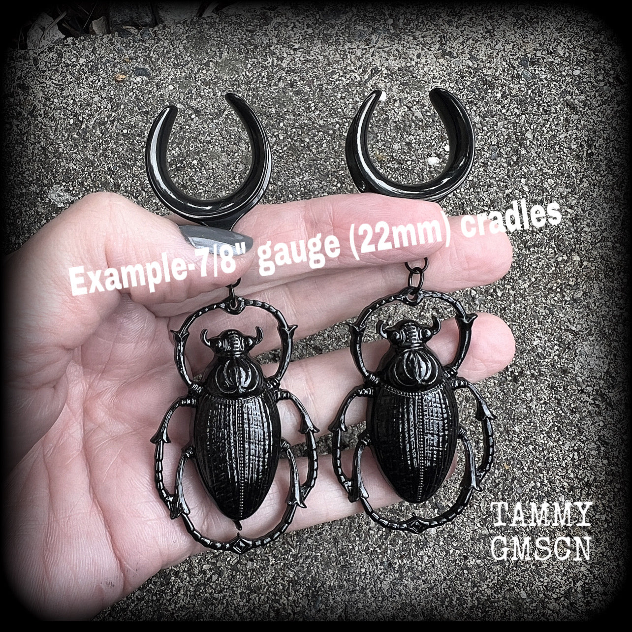 These gorgeous black enamel 'Scarab beetle' gauged earrings measure approx 9cms from tip to tip, and weigh approx. 16 grams a piece, not too heavy.
This pair has been made on 22mm surgical steel cradles, to be worn in stretched lobes.