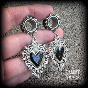 Black sacred heart tunnel earrings with cherbus and filigree details available on a range of different style tunnels from 6mm to 25mm