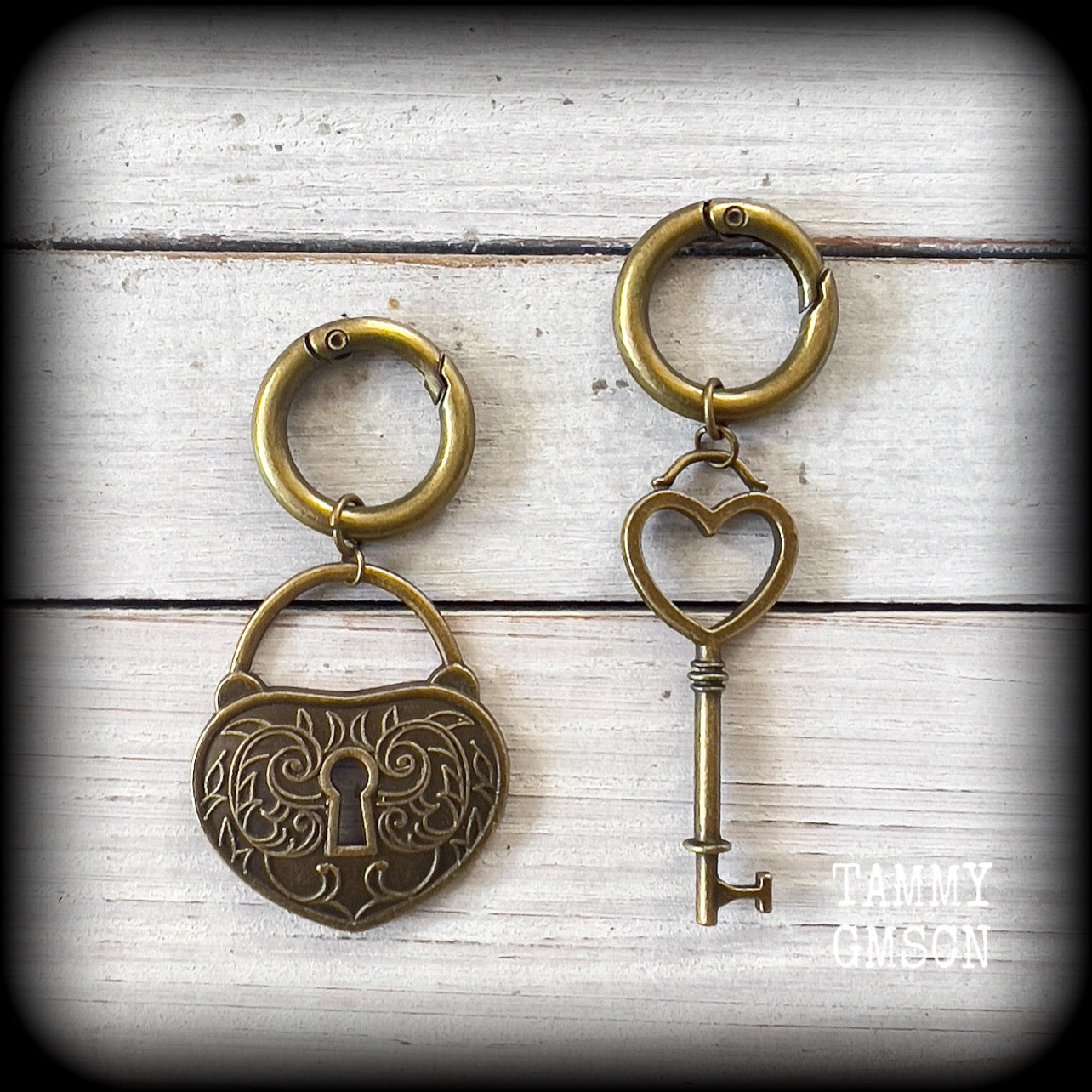 Antique bronze padlock and key hoop earrings-Tunnel hoops