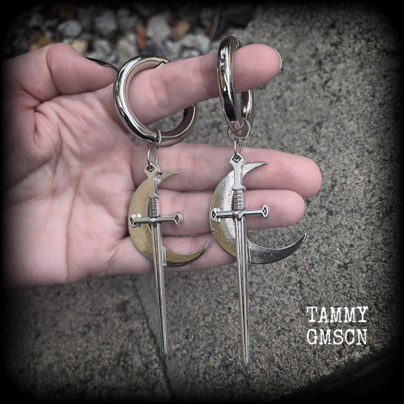 Sword and crescent moon gauged hoop earrings