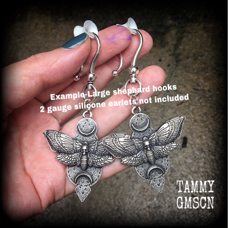 These gorgeous pewter earrings feature a large deaths head moth sitting between two crescent moons, nice and dangly, measuring just under 7cms, and weighing approx 20 grams each.