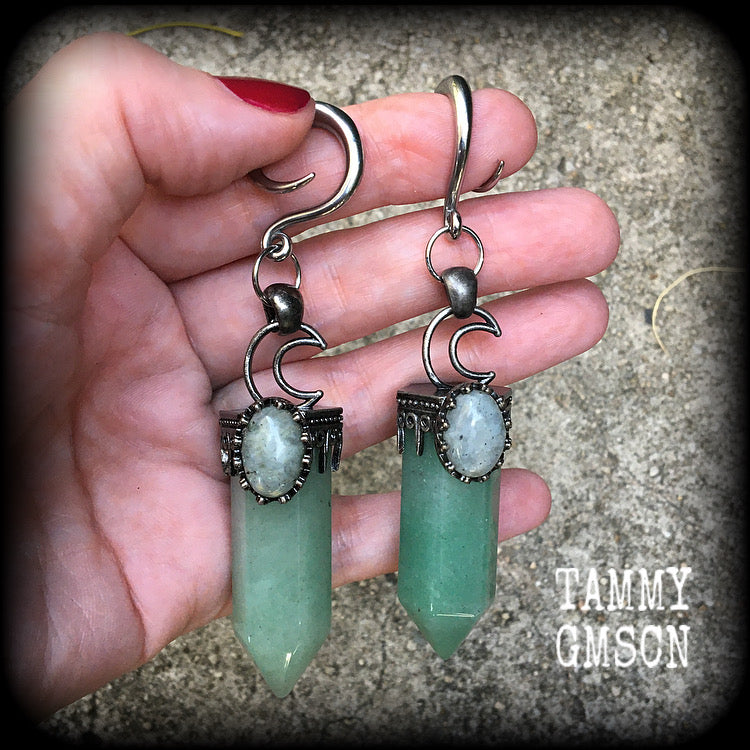 These gorgeous gemstone gauged earrings have been made with beautiful chunky seafoam aventurine and labradorite gemstone points, measuring just under 10 cms from tip to tip, and weighing approx 31 grams each.
These earrings have been made on 6 gauge (4mm) surgical steel full curl hooks, suitable for stretched lobes.