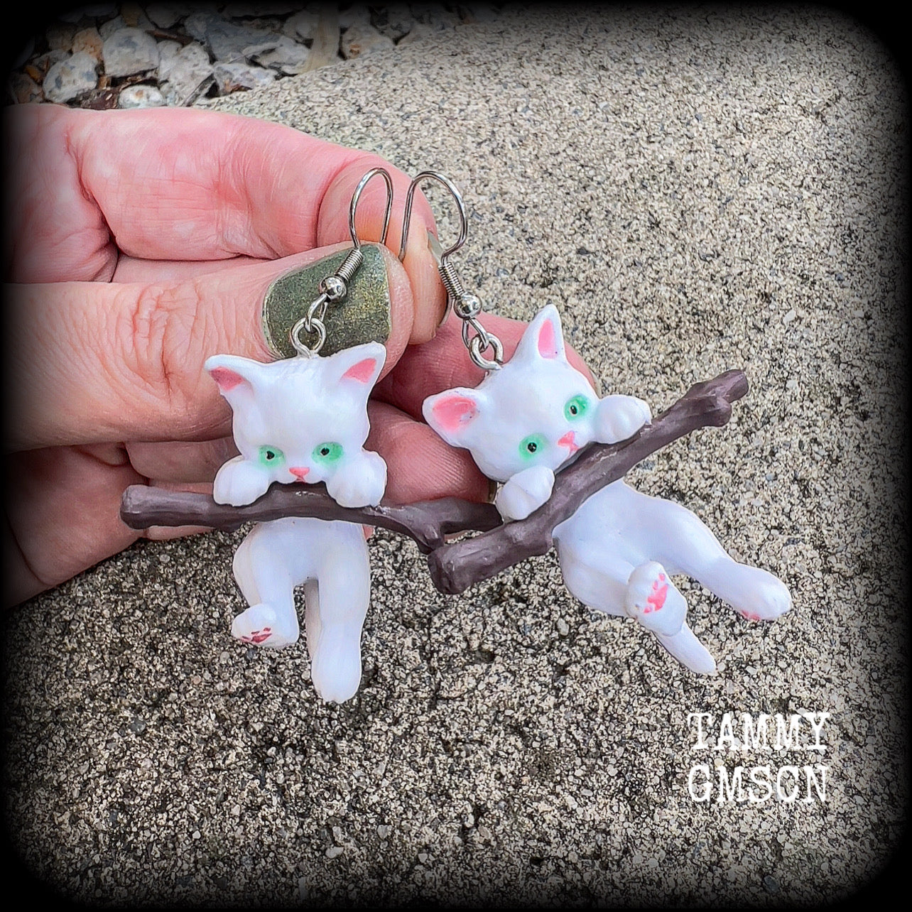 White cat earrings 