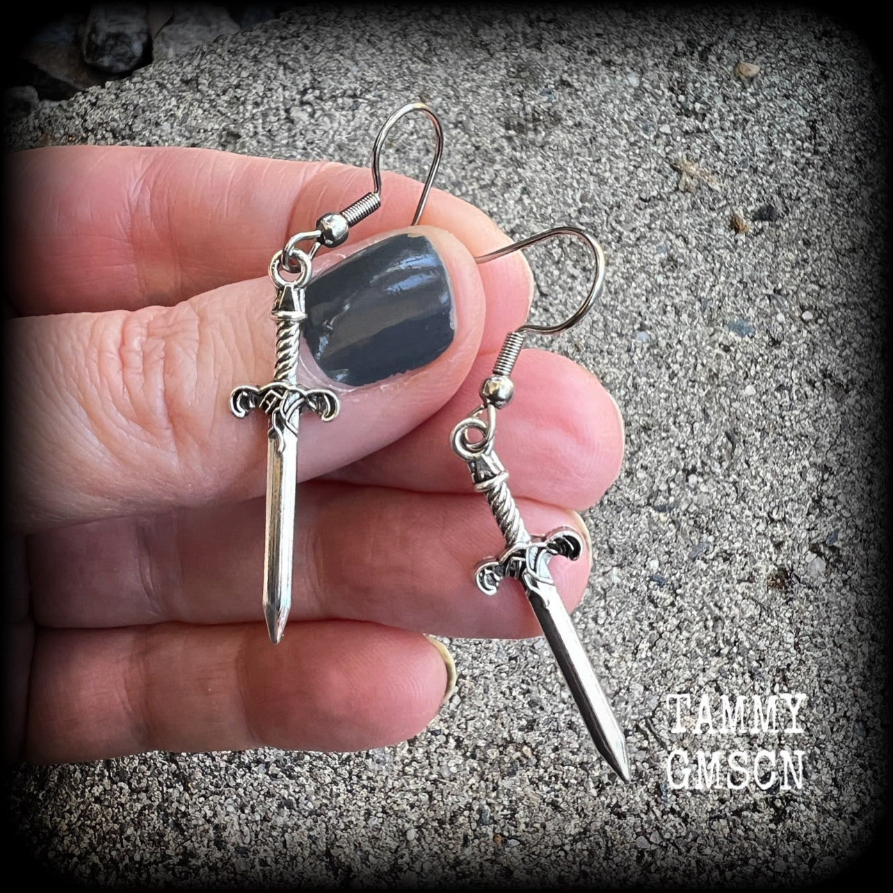 These awesome antique silver sword earrings are super light weight, weighing only a few grams each, and measure just under 4cms from tip to tip.
This pair has been made on stainless steel french hooks, suitable for pierced ears.
