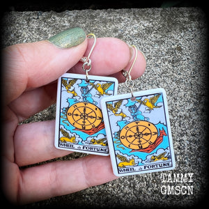These earrings feature a lightweight acrylic 'Wheel of Fortune' tarot card charm, measuring just on 5cms from tip to tip, weighing only a gram or two each.

This pair has been made with antique silver leverback hooks, suitable for pierced ears or stretched lobes.