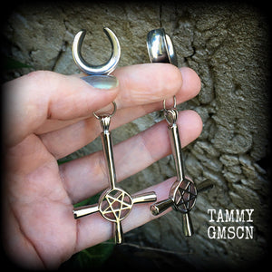 Inverted cross cradles These gorgeous gothic earrings feature antique silver inverted cross and pentagrams, are nice and dangly, measuring just on 9 cms from tip to tip and weigh approx 15 grams each.

This pair have been made on 5/8" gauge (16mm) surgical steel cradles, suitable for stretched lobes.