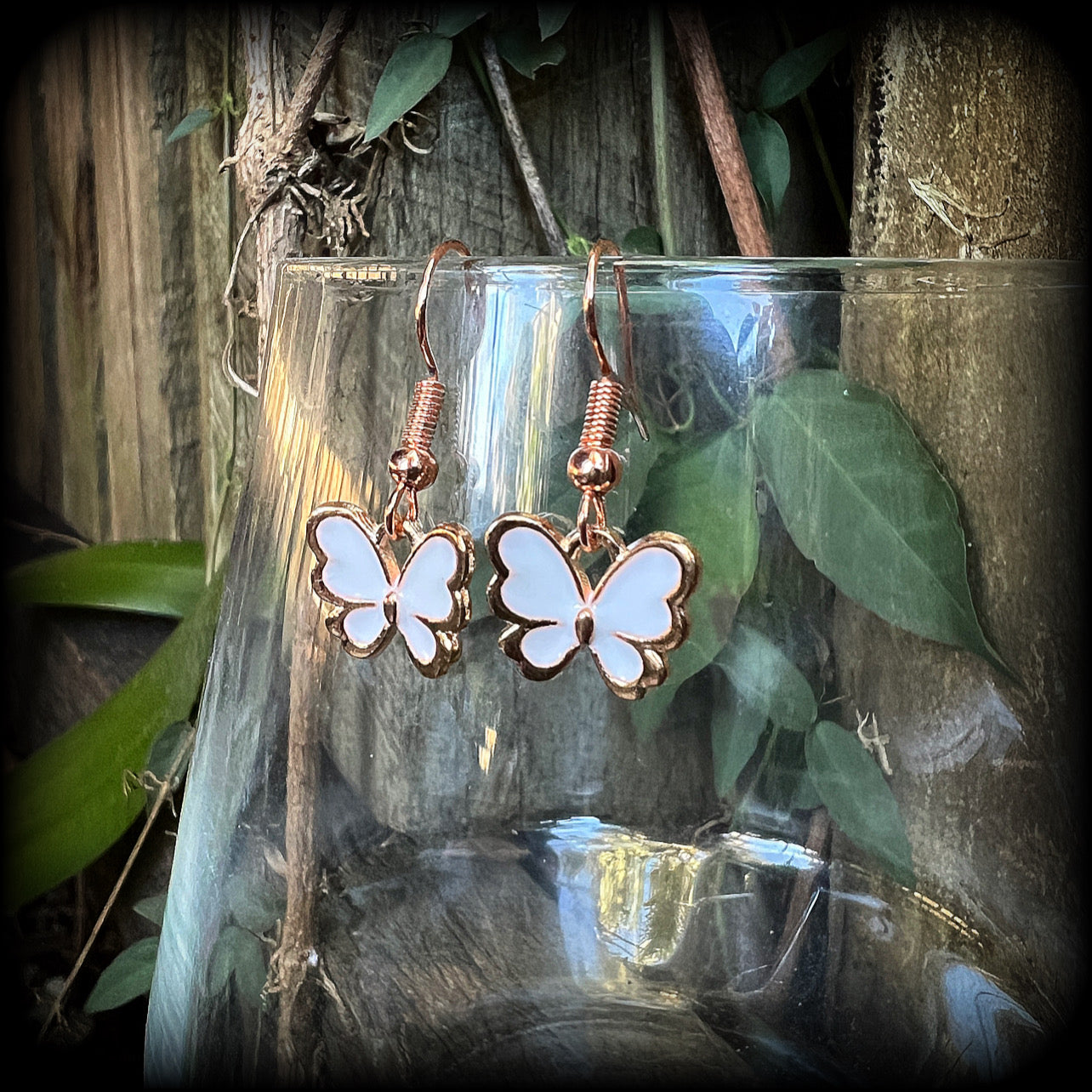 White butterfly earrings