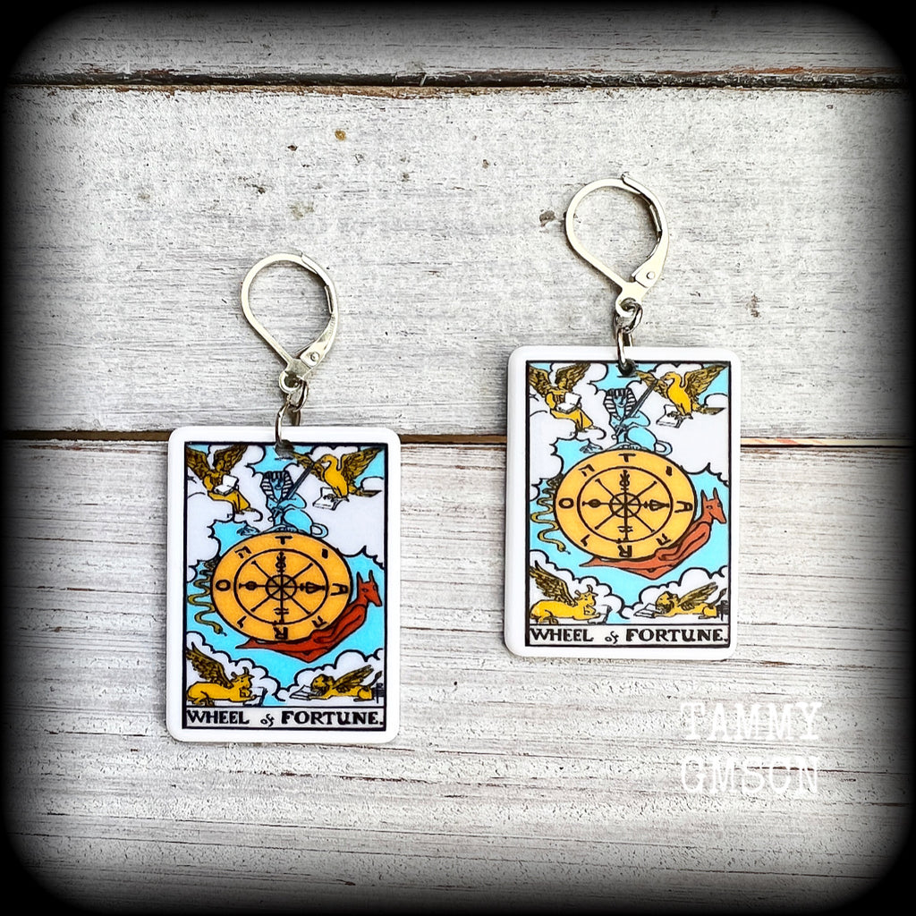 These earrings feature a lightweight acrylic 'Wheel of Fortune' tarot card charm, measuring just on 5cms from tip to tip, weighing only a gram or two each.

This pair has been made with antique silver leverback hooks, suitable for pierced ears or stretched lobes.