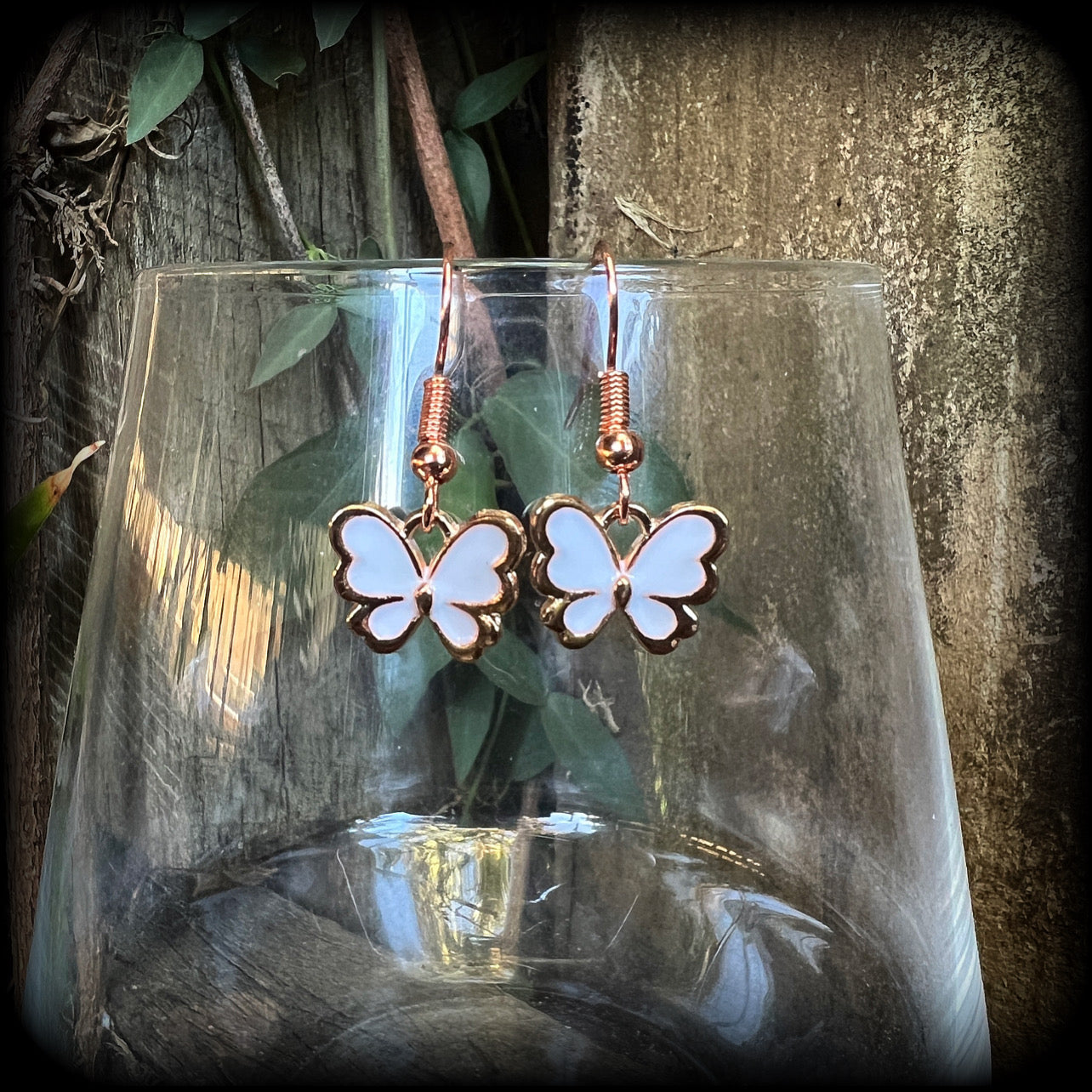 White butterfly earrings