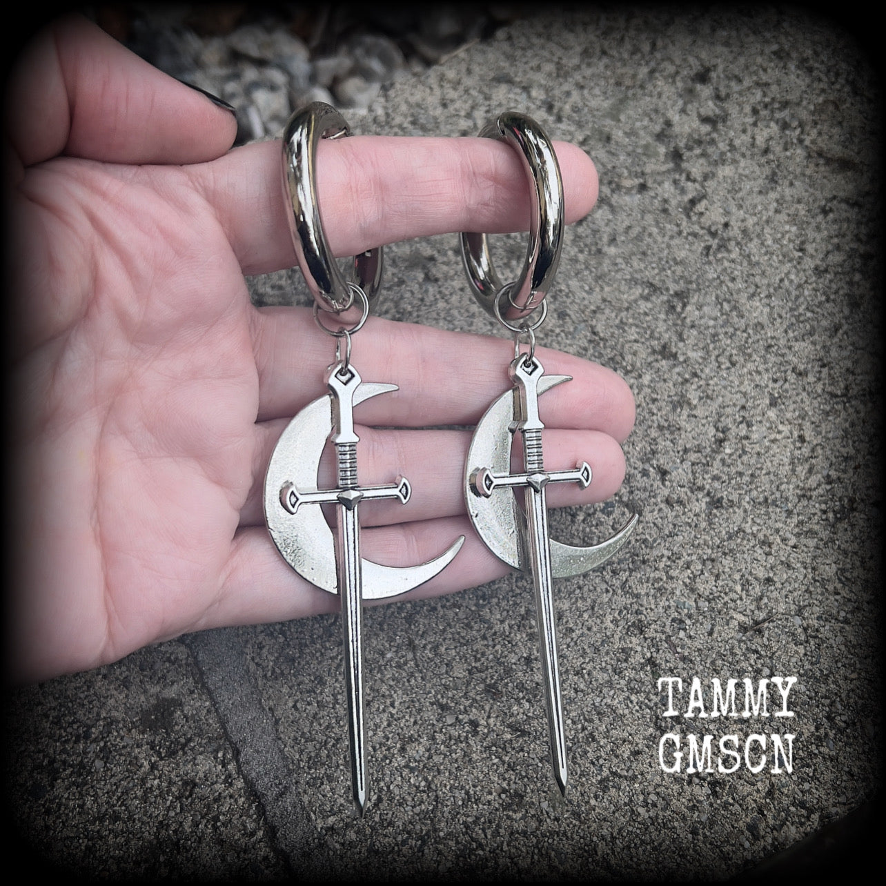 Sword and crescent moon gauged hoop earrings